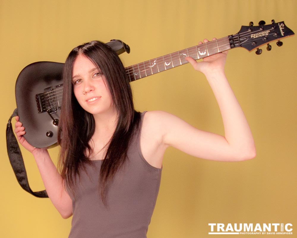 I saw an amazing picture on a web site of this female guitarist.  She was beautiful.  After a bit of searching, I was able to contact her and we did this shoot together.
